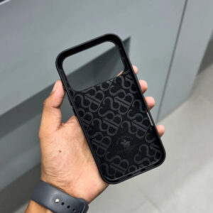 Black leather iPhone 17 Pro Max case with pattern and MagSafe.