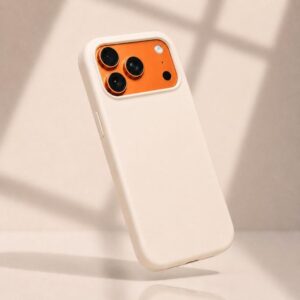 White silicone case for iPhone 17 Pro Max with orange camera cover.