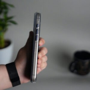Luxury iPhone 17 Pro case with hanging rope bracket for Magsafe protection.